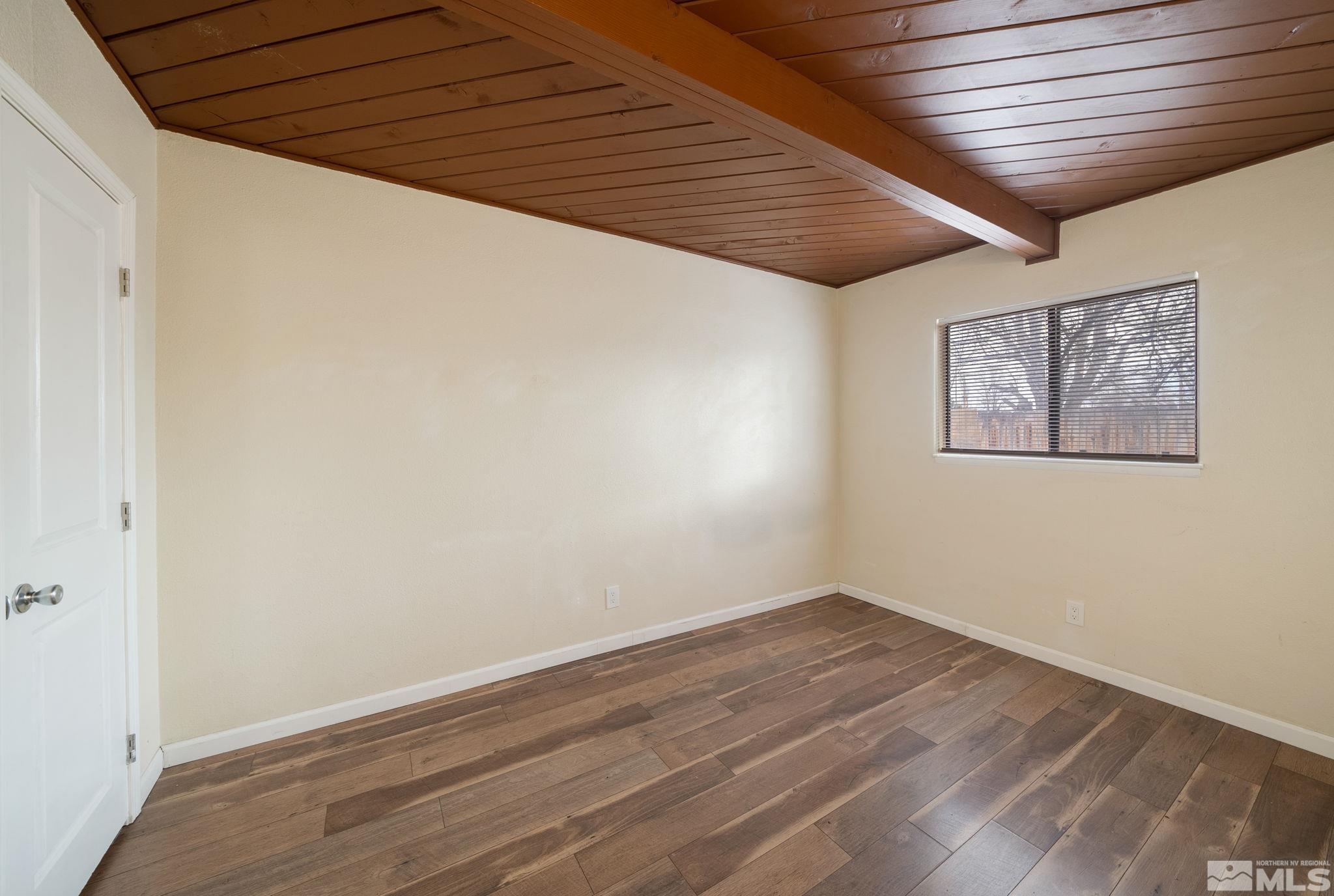 1680 Sterling Way Reno, NV 89512 - Photo 15 of 20 an empty room with wooden floor