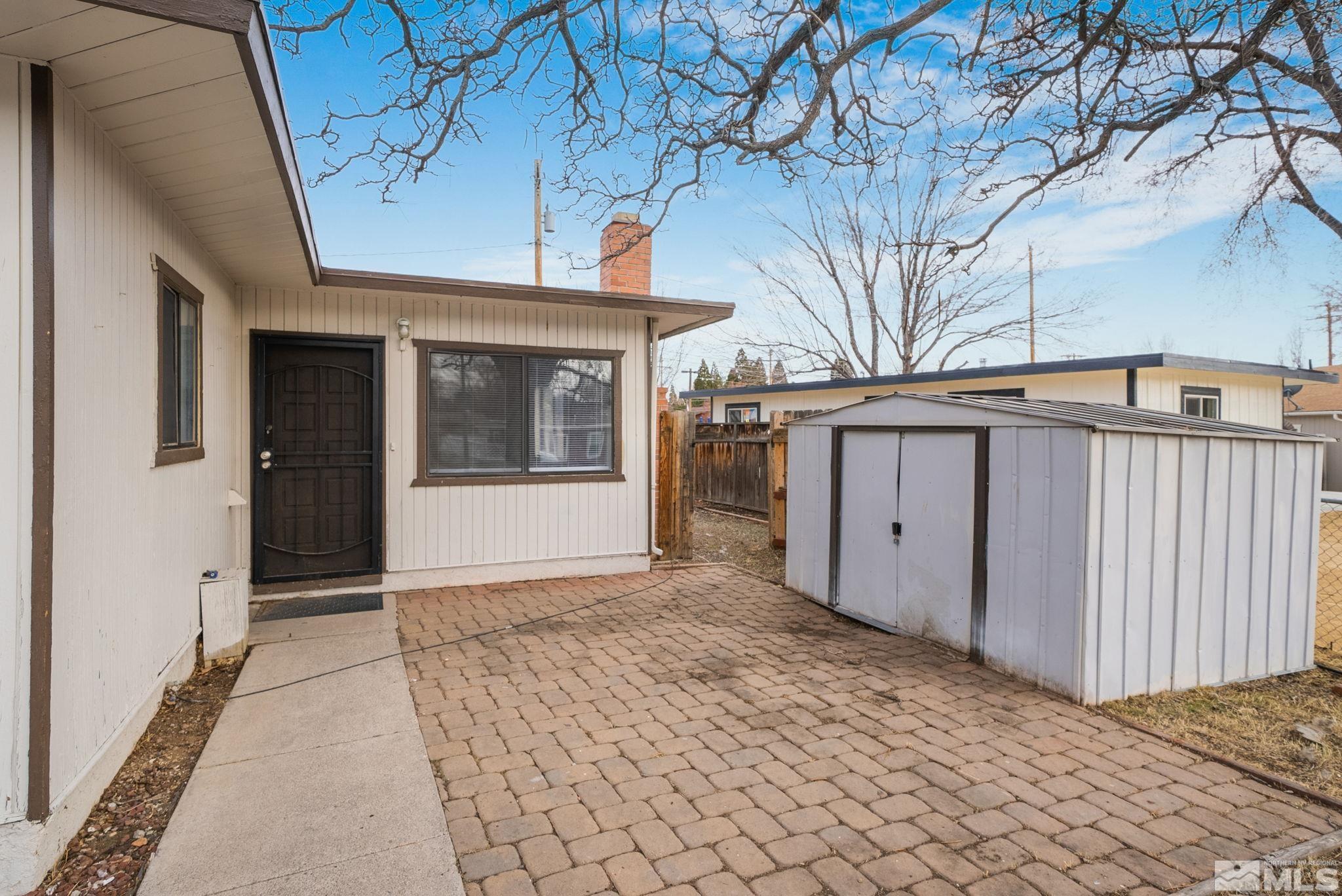 1680 Sterling Way Reno, NV 89512 - Photo 17 of 20 a view of entrance gate of a house
