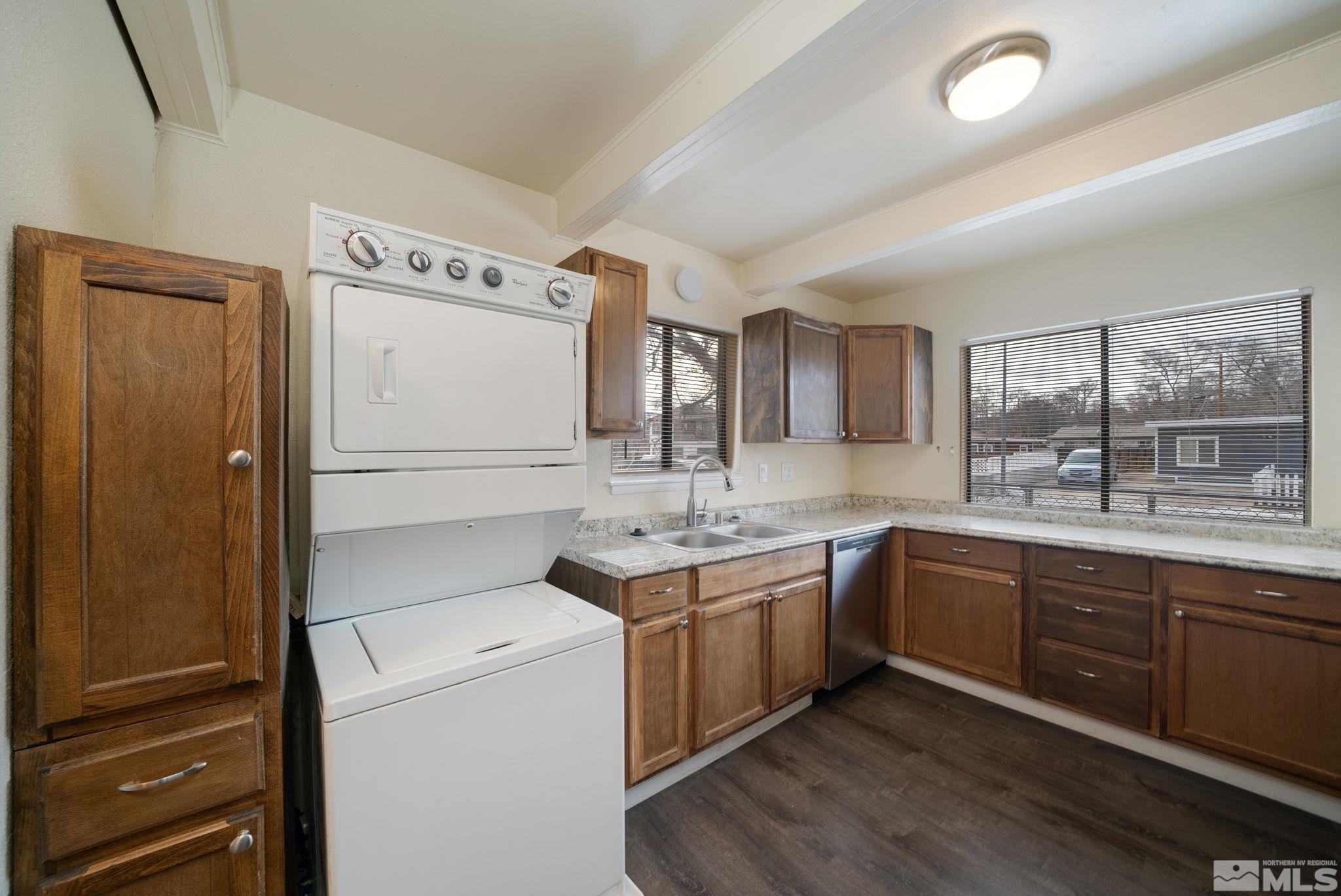 1680 Sterling Way Reno, NV 89512 - Photo 5 of 20 a kitchen with a stove sink and refrigerator