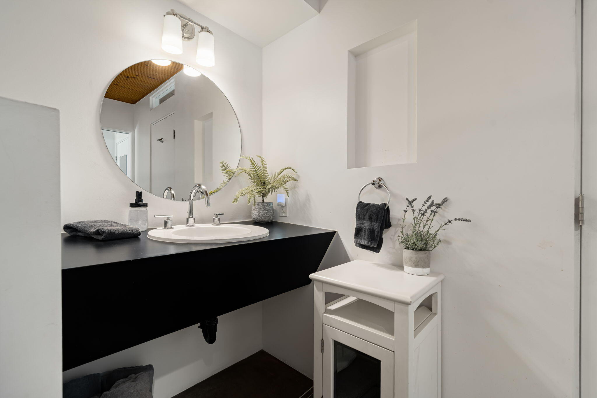 623 Desert Way Palm Springs, CA 92264 - Photo 15 of 39 a bathroom with a sink and a mirror