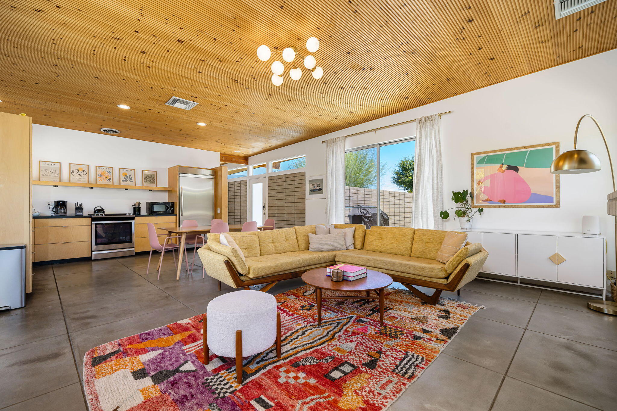 623 Desert Way Palm Springs, CA 92264 - Photo 7 of 39 a living room with furniture and a chandelier