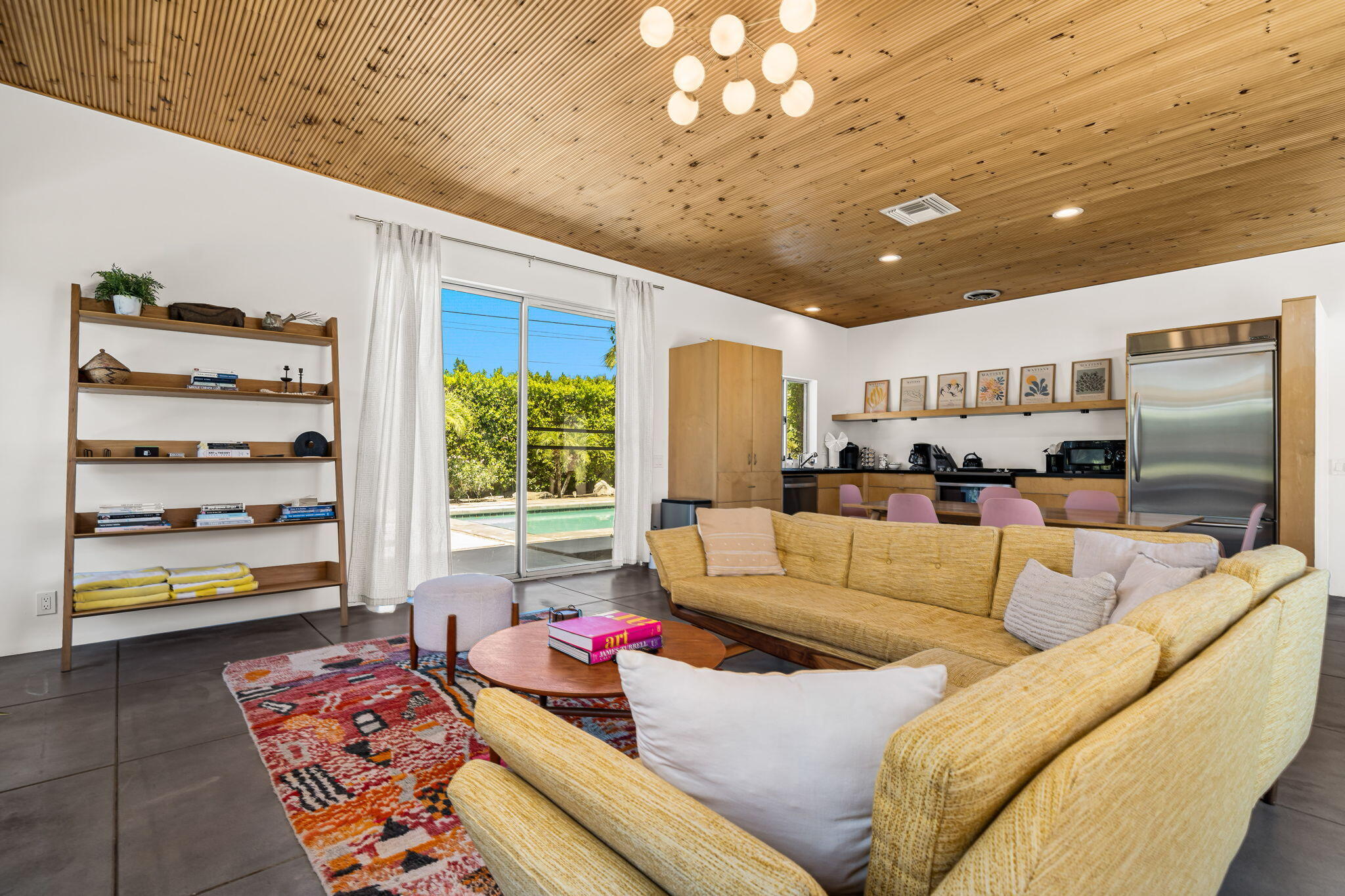 623 Desert Way Palm Springs, CA 92264 - Photo 8 of 39 a living room with furniture and a large window