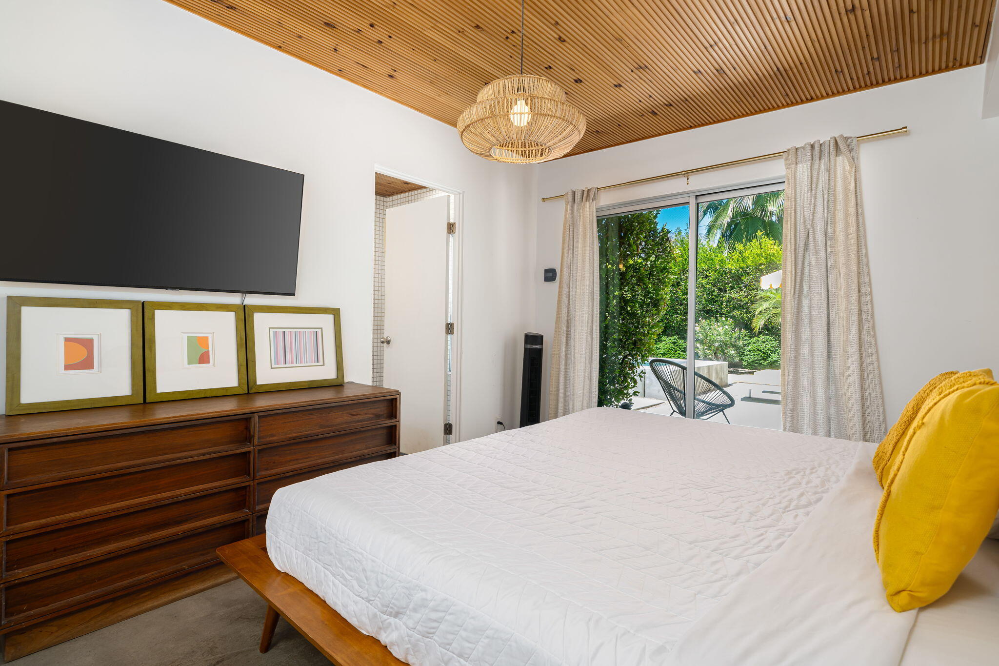 623 Desert Way Palm Springs, CA 92264 - Photo 10 of 39 a bedroom with a bed and wooden floor