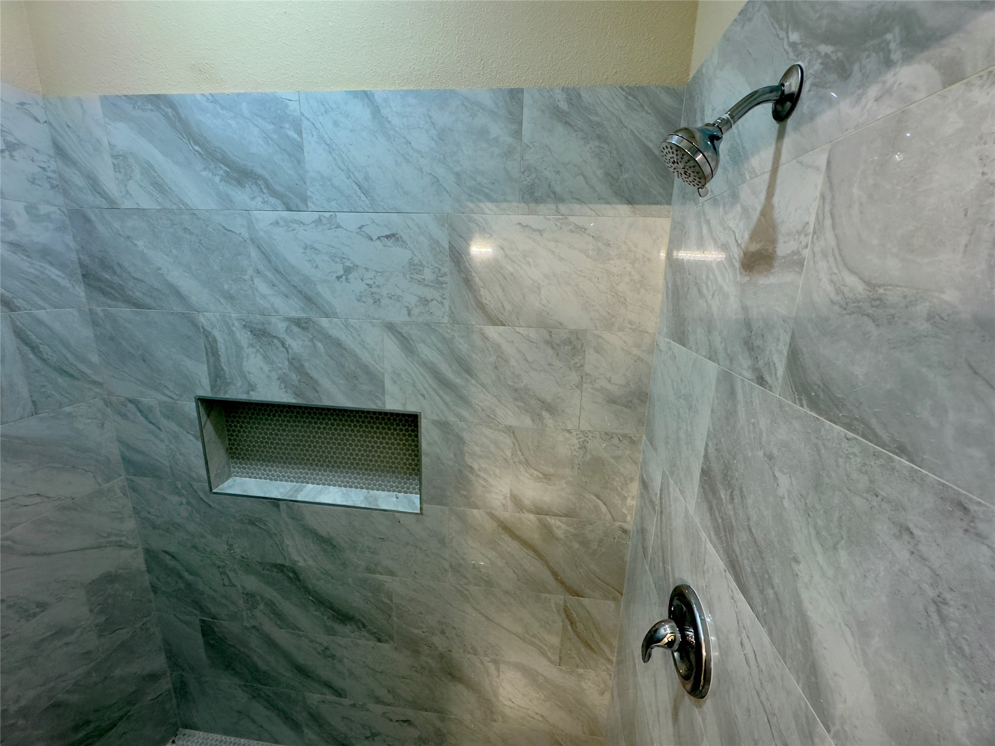 10730 Vinson Street Beaumont, TX 77713 - Photo 11 of 15 a bathroom with a shower