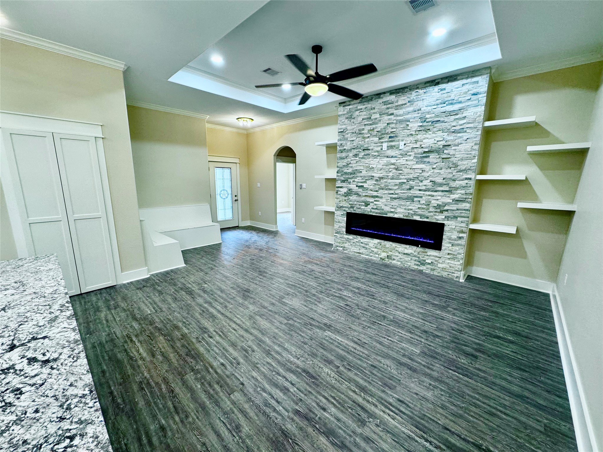 10730 Vinson Street Beaumont, TX 77713 - Photo 4 of 15 a living room with furniture and a fireplace