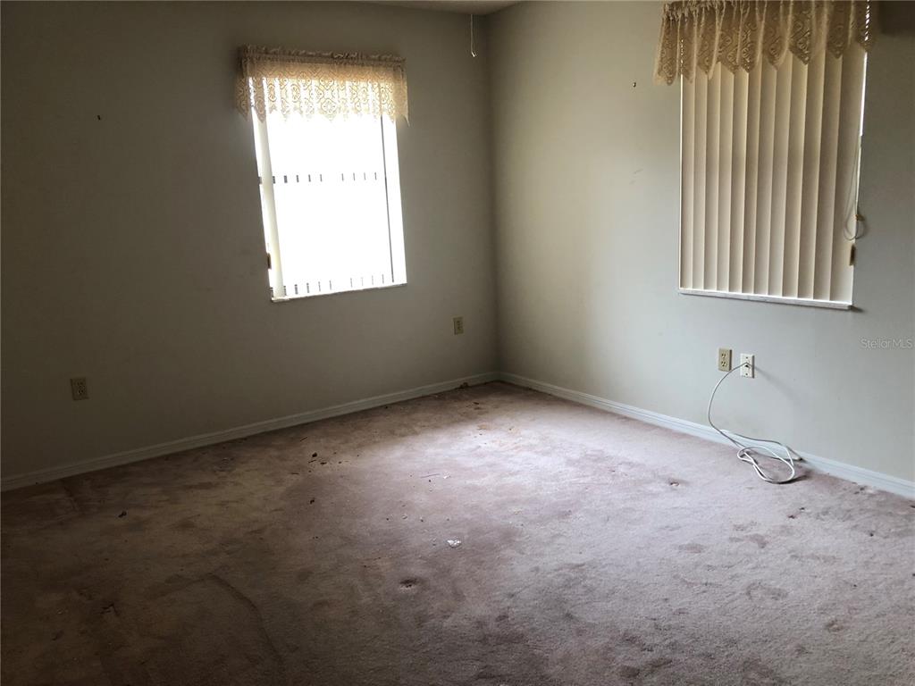 34847 Learn Road Leesburg, FL 34788 - Photo 16 of 42 an empty room with a window