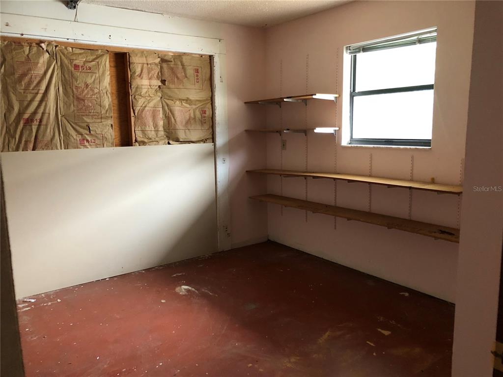 34847 Learn Road Leesburg, FL 34788 - Photo 24 of 42 a view of an empty room with a window