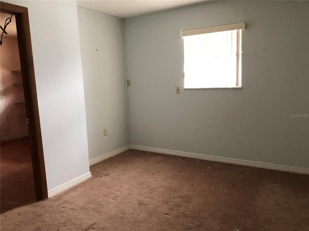 34847 Learn Road Leesburg, FL 34788 - Photo 26 of 42 an empty room with a window
