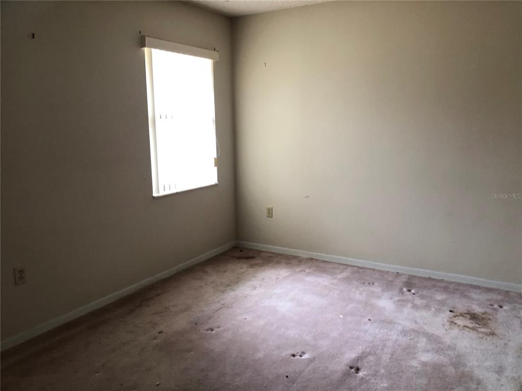 34847 Learn Road Leesburg, FL 34788 - Photo 28 of 42 an empty room with a window