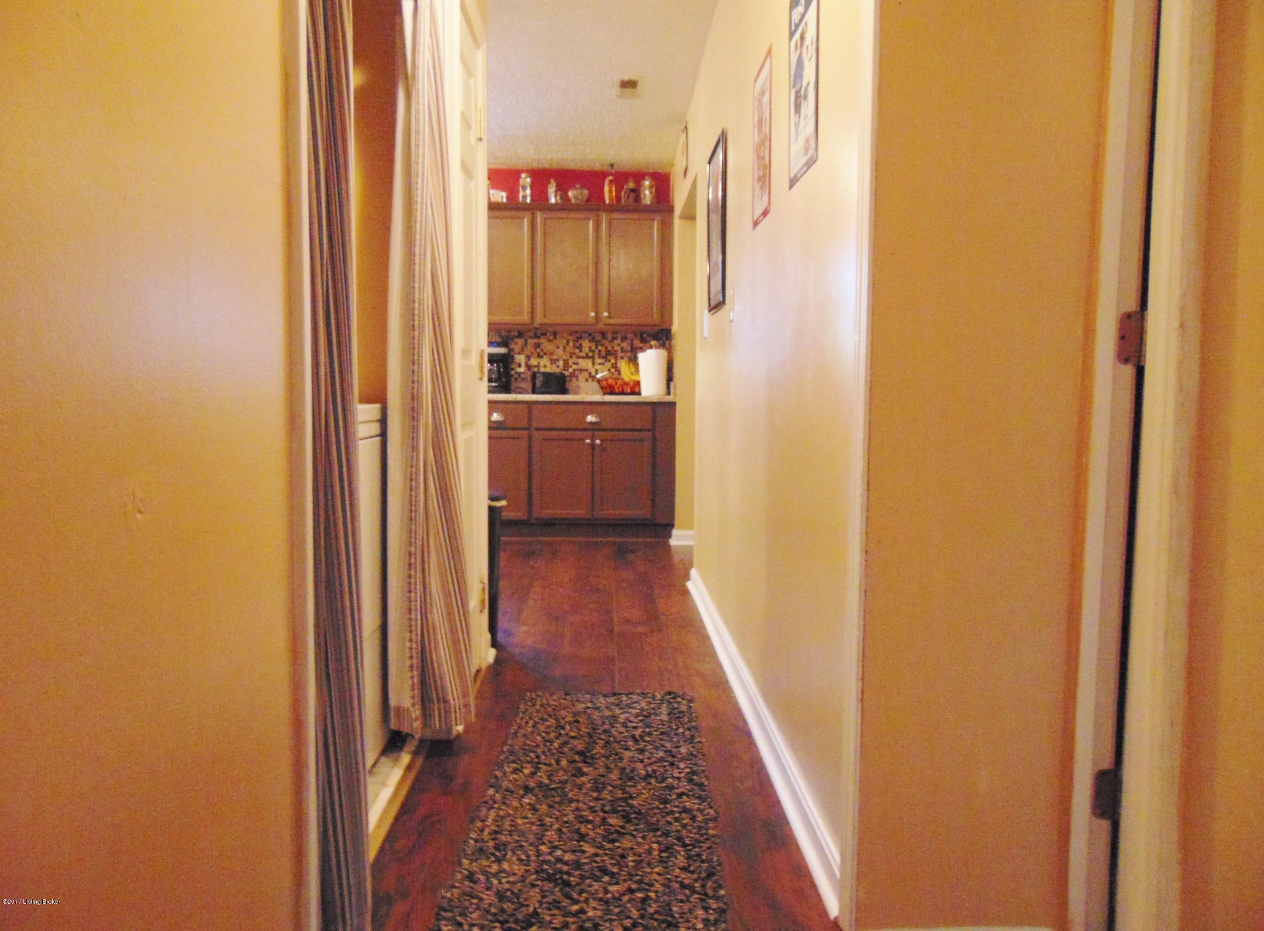 511 Brownsboro Road Pendleton, KY 40055 - Photo 24 of 32 Looking from the kitchen down the hallway towards 3 of the 4 bedrooms