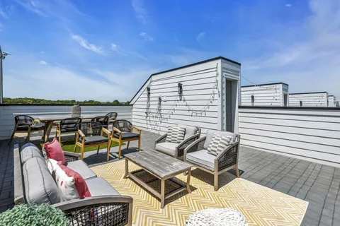 a view of a chairs and table in the terrace