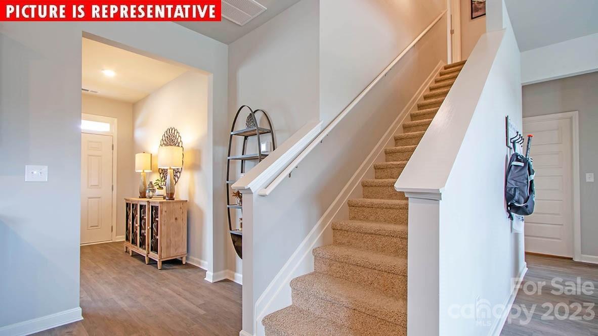 2167 Vanderlyn Street Monroe, NC 28112 - Photo 18 of 22 a view of an entryway with staircase