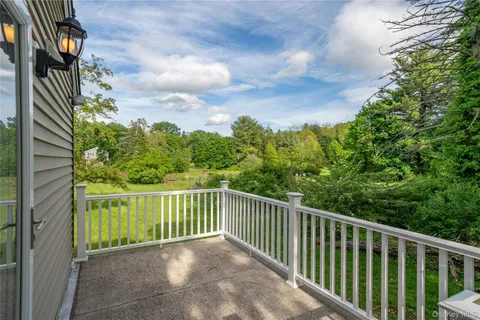 a view of a balcony with outside space