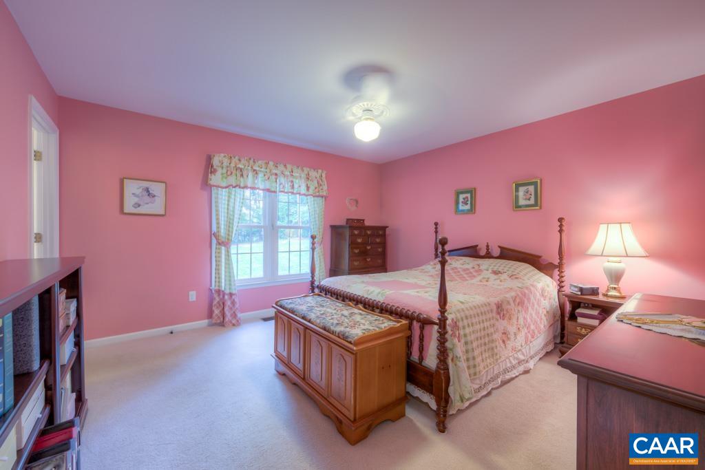 95 Rudolph Street Ruckersville, VA 22968 - Photo 23 of 34 a spacious bedroom with a bed and a window