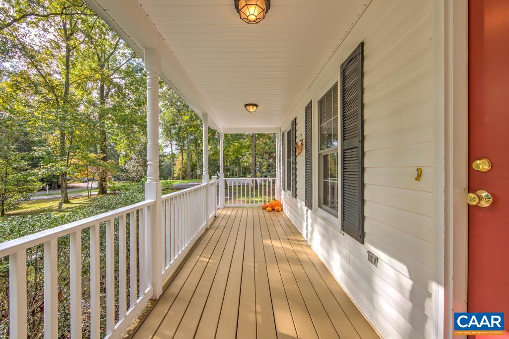 95 Rudolph Street Ruckersville, VA 22968 - Photo 3 of 34 a view of balcony with a large window and wooden floor