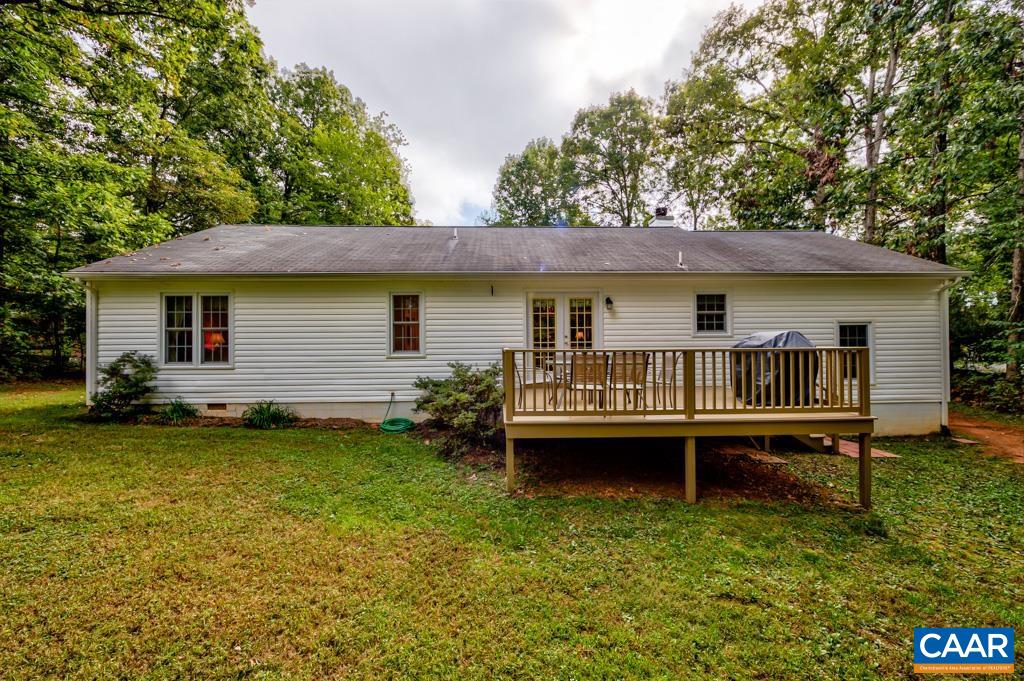 95 Rudolph Street Ruckersville, VA 22968 - Photo 34 of 34 a view of a house with a backyard and a patio