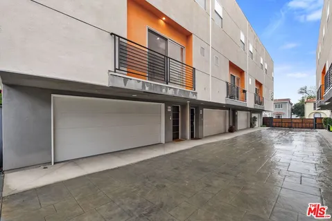 a view of a building with a street