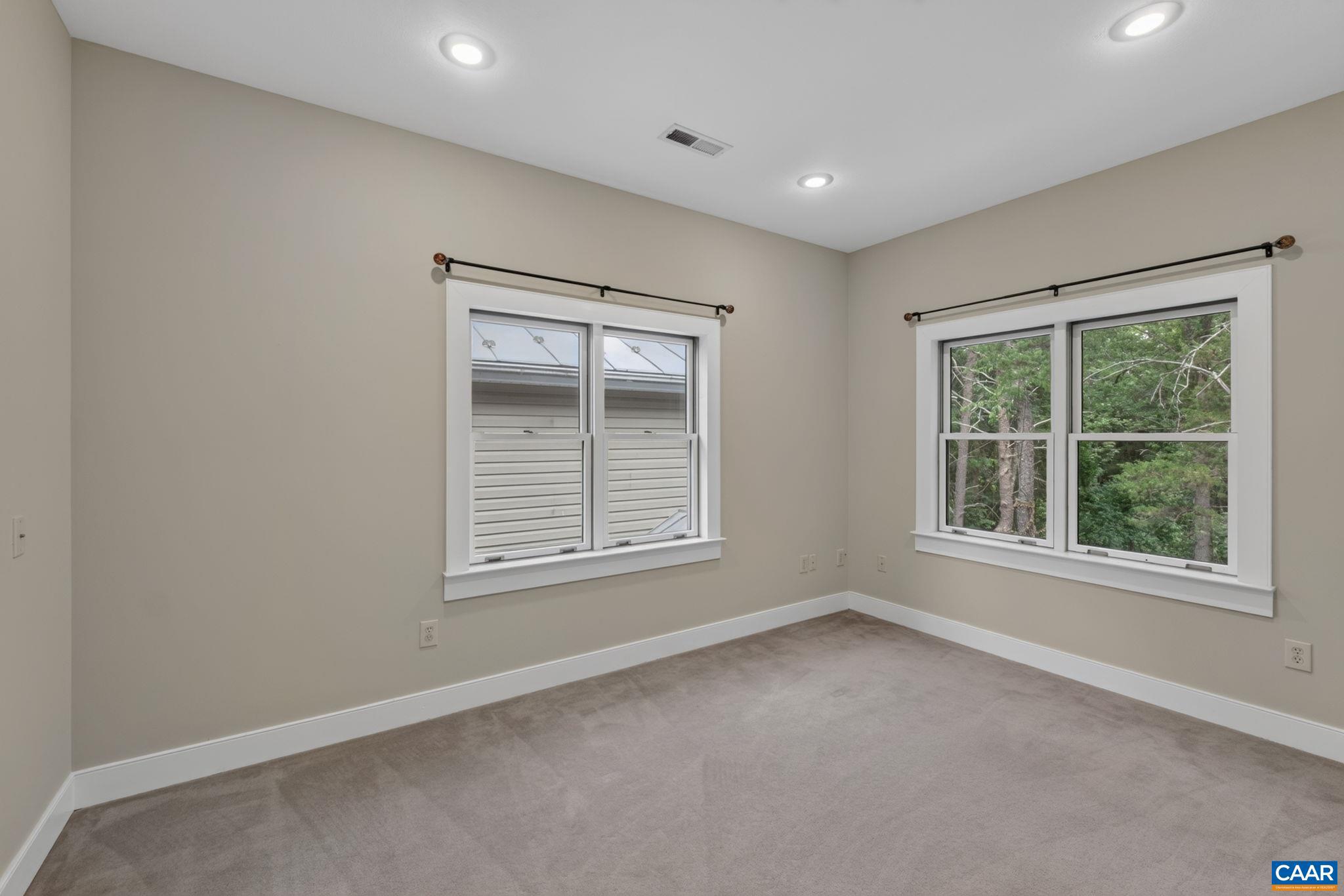 6285 Jarmans Gap Road Crozet, VA 22932 - Photo 24 of 65 an empty room with windows