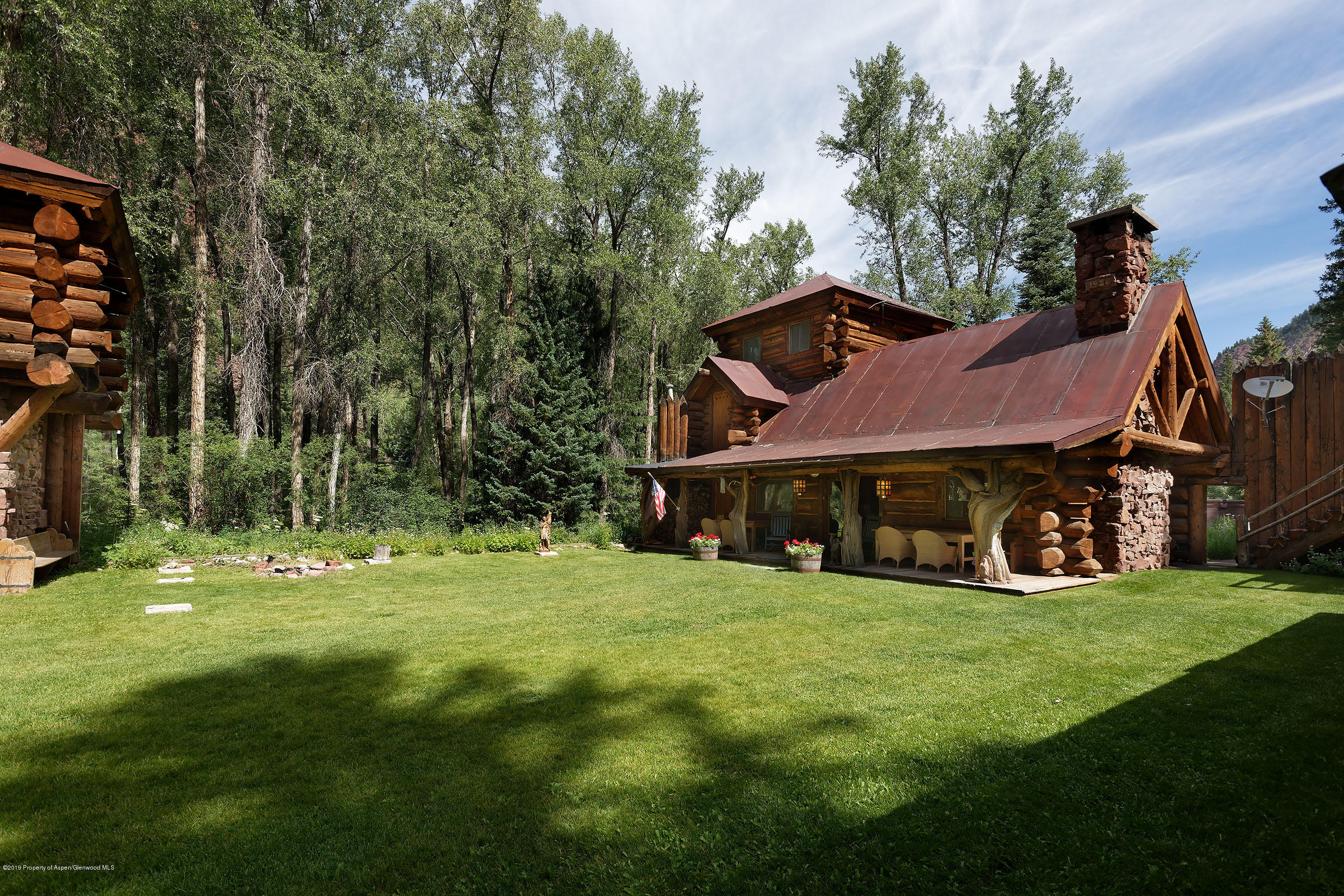245-289 Conundrum Creek Road Aspen, CO 81611 - Photo 12 of 28 a view of a house with a big yard