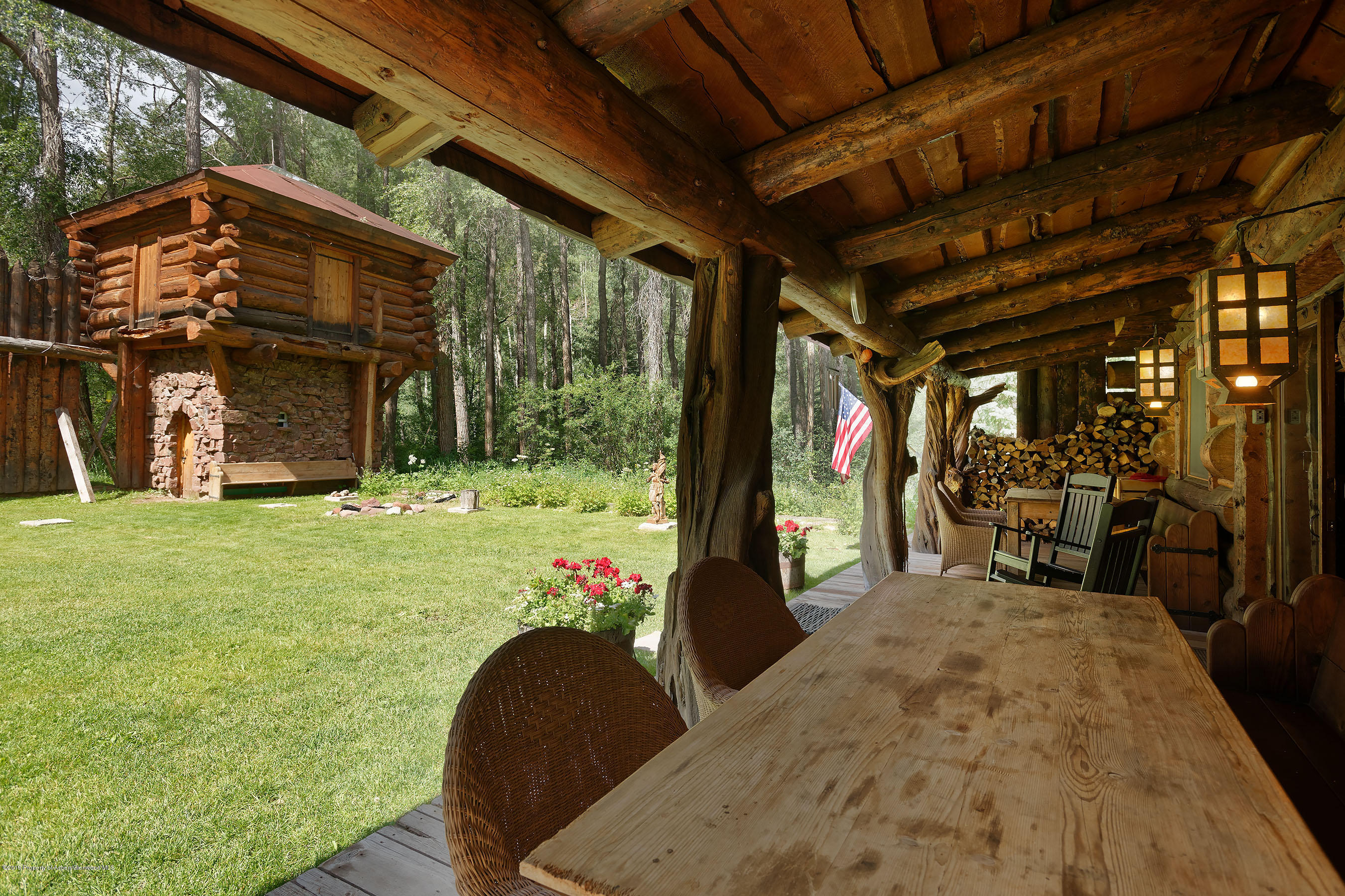245-289 Conundrum Creek Road Aspen, CO 81611 - Photo 8 of 28 a view of a porch with furniture