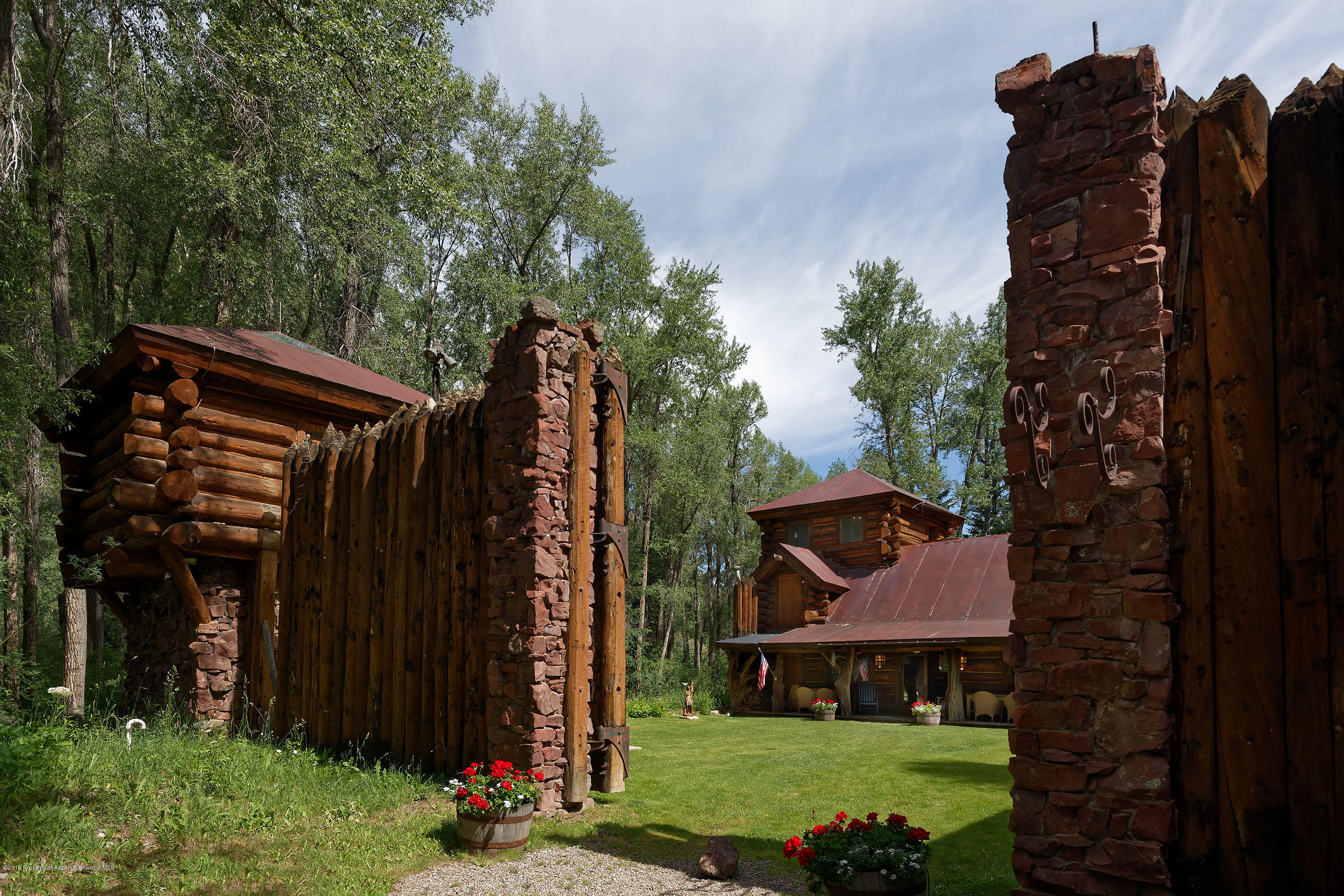245-289 Conundrum Creek Road Aspen, CO 81611 - Photo 10 of 28 a view of a house with backyard and garden