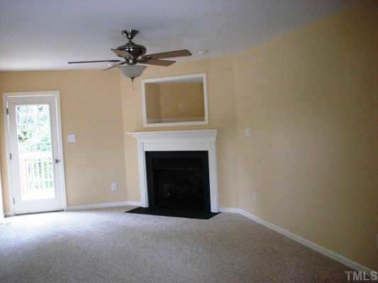 LARGE OPEN FAMILY ROOM WITH GAS LOG FIRE PLACE.ROOM ALSO HAS EASY ACCESS TO REAR DECK.