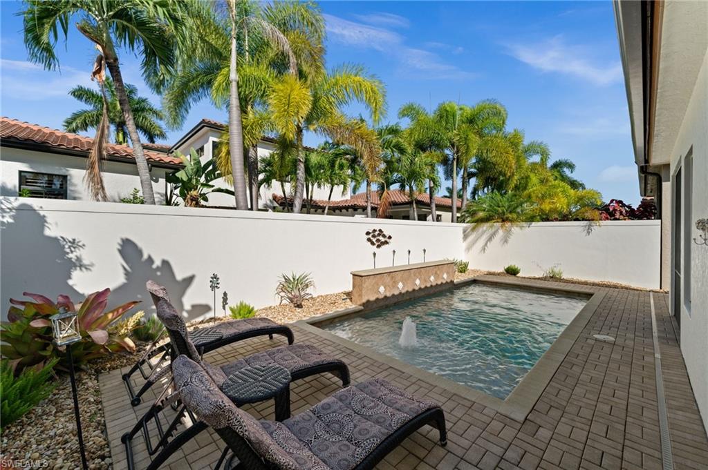 8000 Cordoba Place Naples, FL 34113 - Photo 4 of 40 Spacious lounging area, private pool & entertaining area