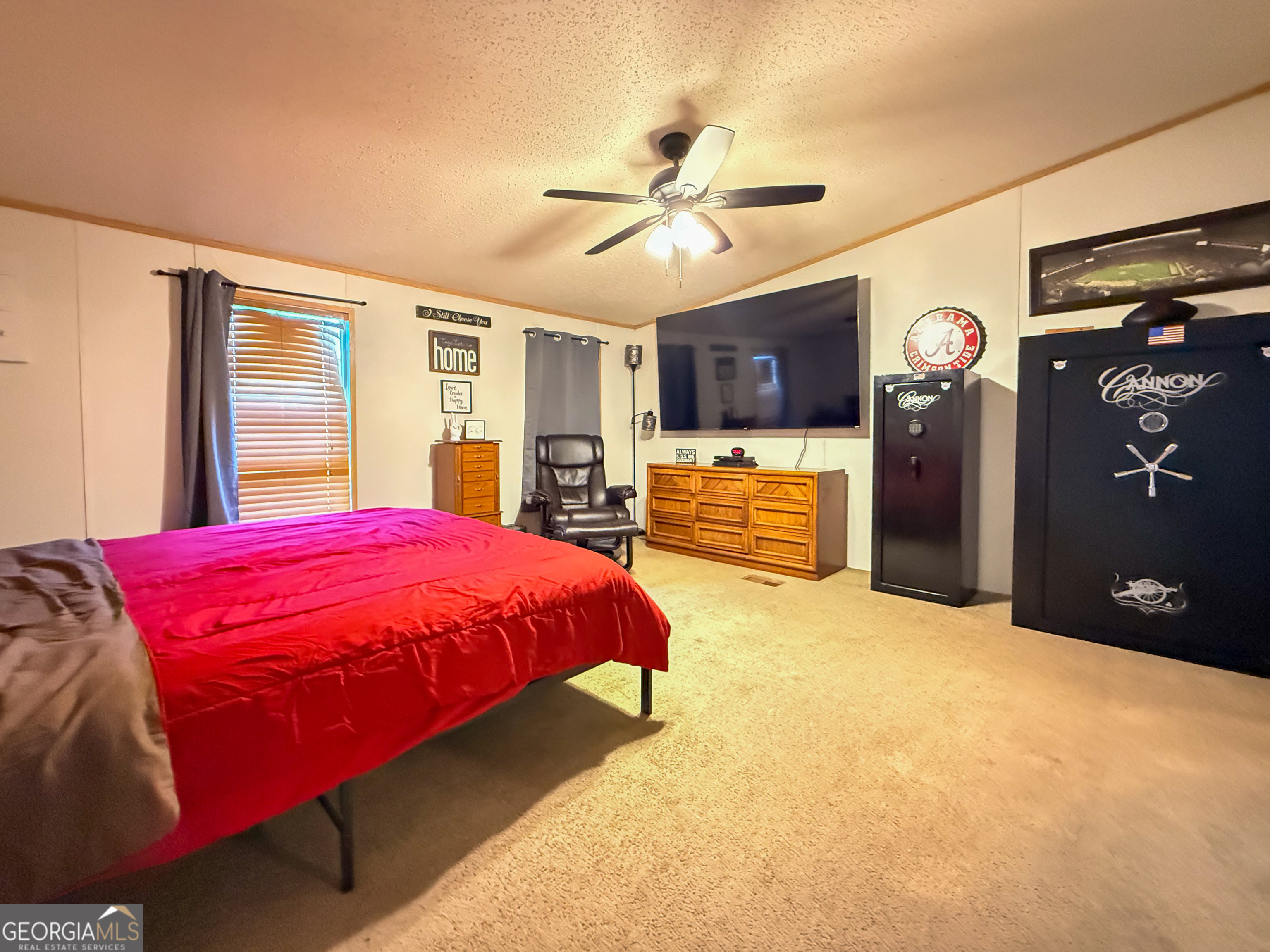 551 Hester Road Dahlonega, GA 30533 - Photo 13 of 35 a bed room with a bed and a lamp