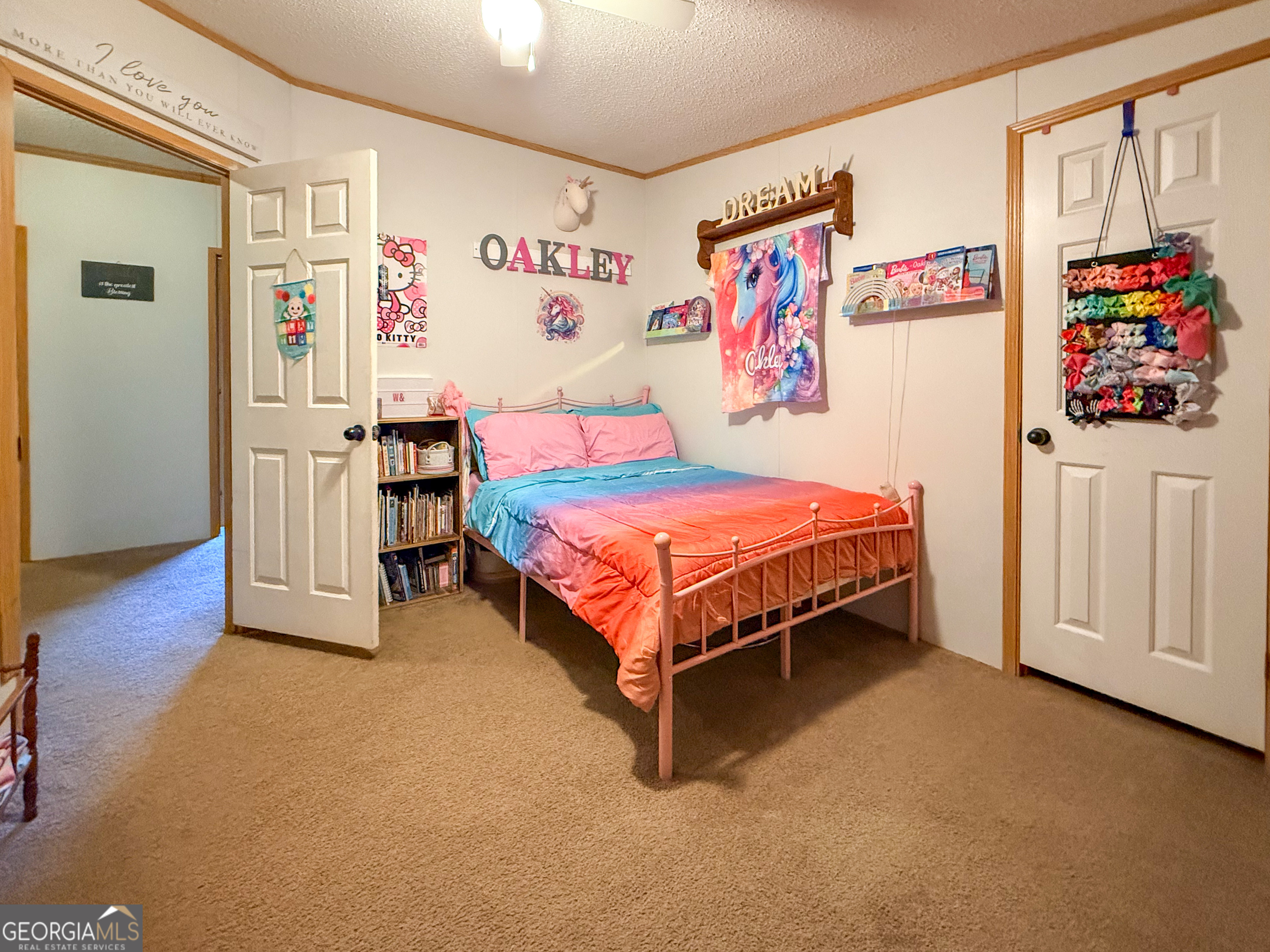 551 Hester Road Dahlonega, GA 30533 - Photo 22 of 35 a bedroom with a bed and cabinets