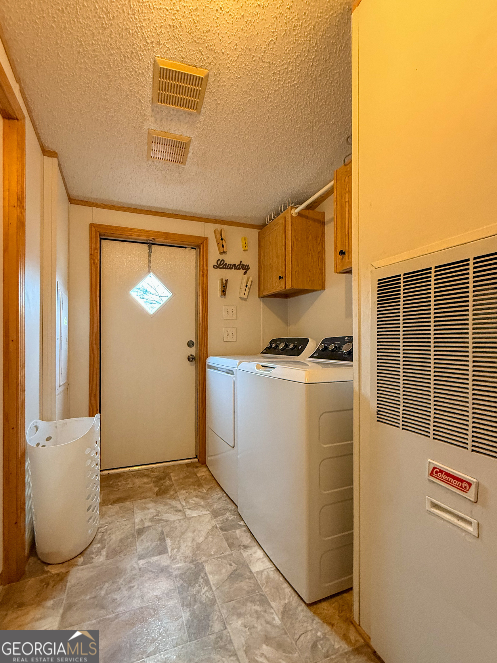 551 Hester Road Dahlonega, GA 30533 - Photo 24 of 35 a room with storage and utility