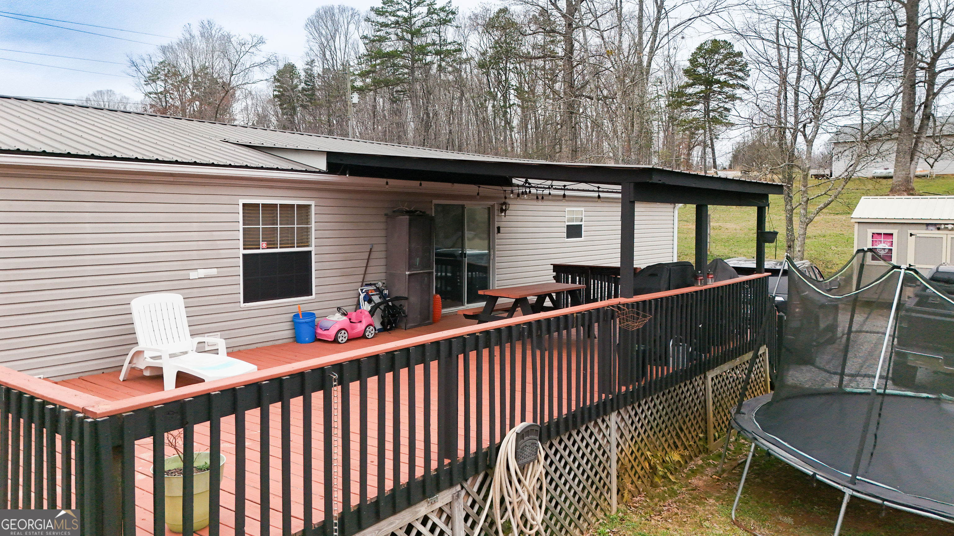 551 Hester Road Dahlonega, GA 30533 - Photo 30 of 35 a balcony view with two chairs and a table