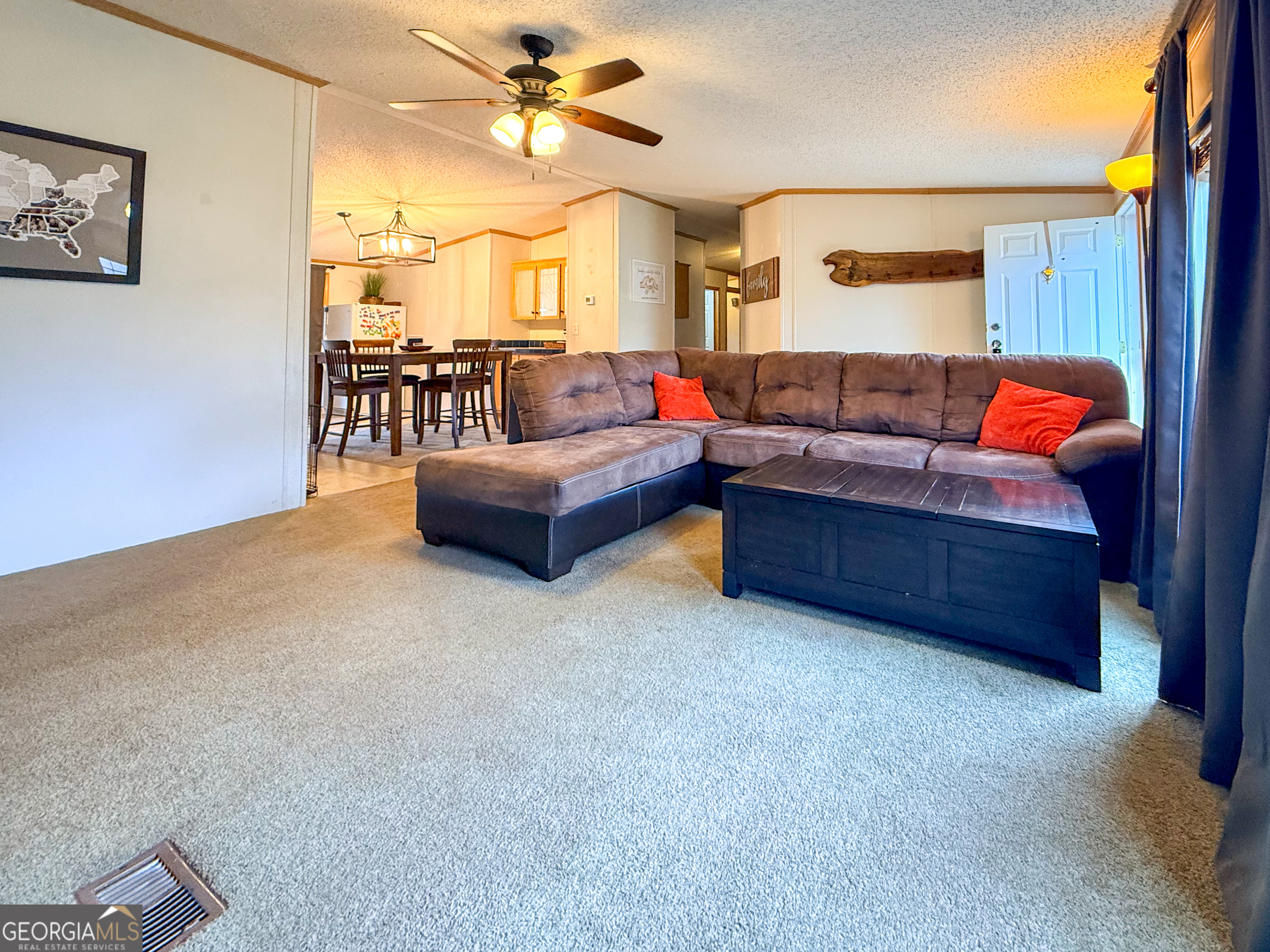 551 Hester Road Dahlonega, GA 30533 - Photo 5 of 35 a living room with furniture and a large window