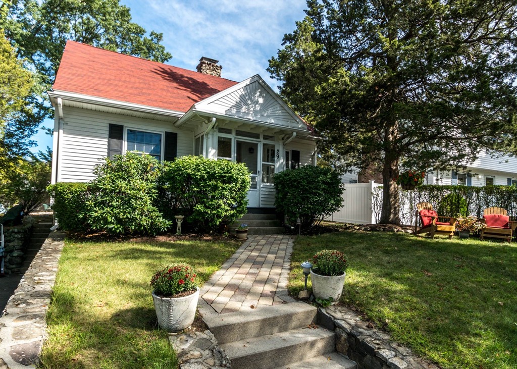29 Virginia Road Waltham, MA 02453 - Photo 18 of 19 a front view of a house with garden