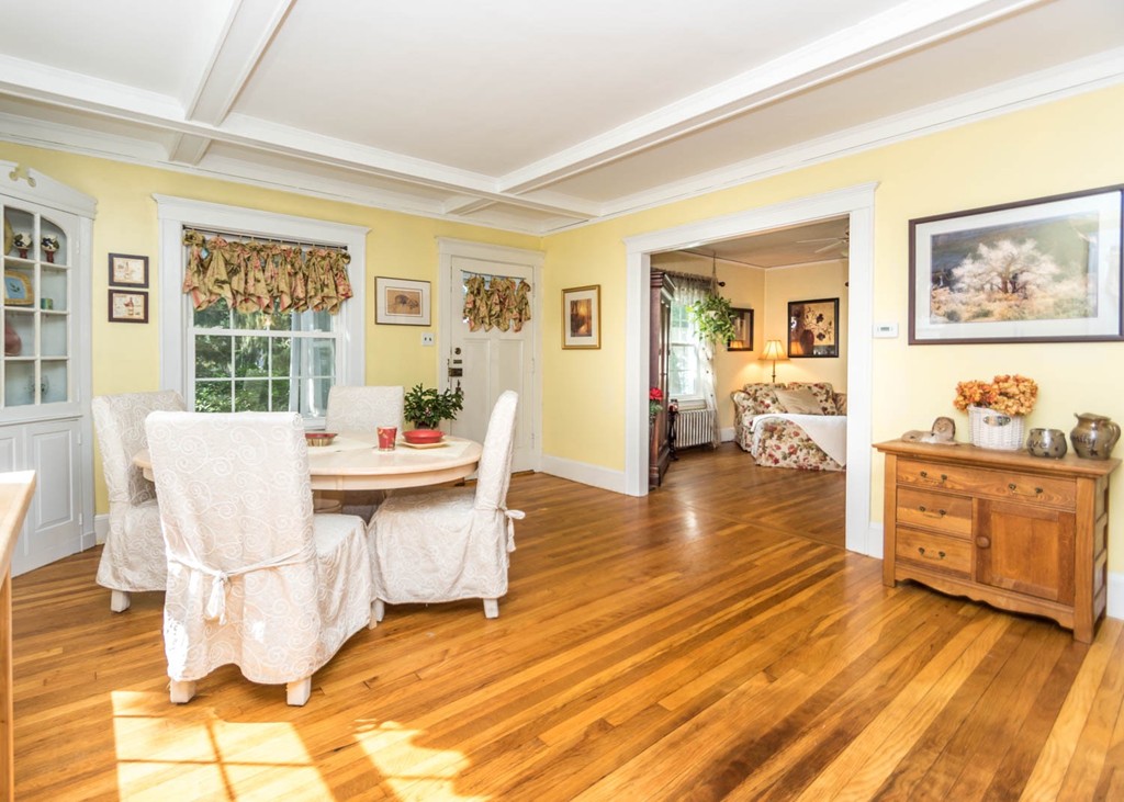 29 Virginia Road Waltham, MA 02453 - Photo 6 of 19 a living room with fireplace furniture and a table