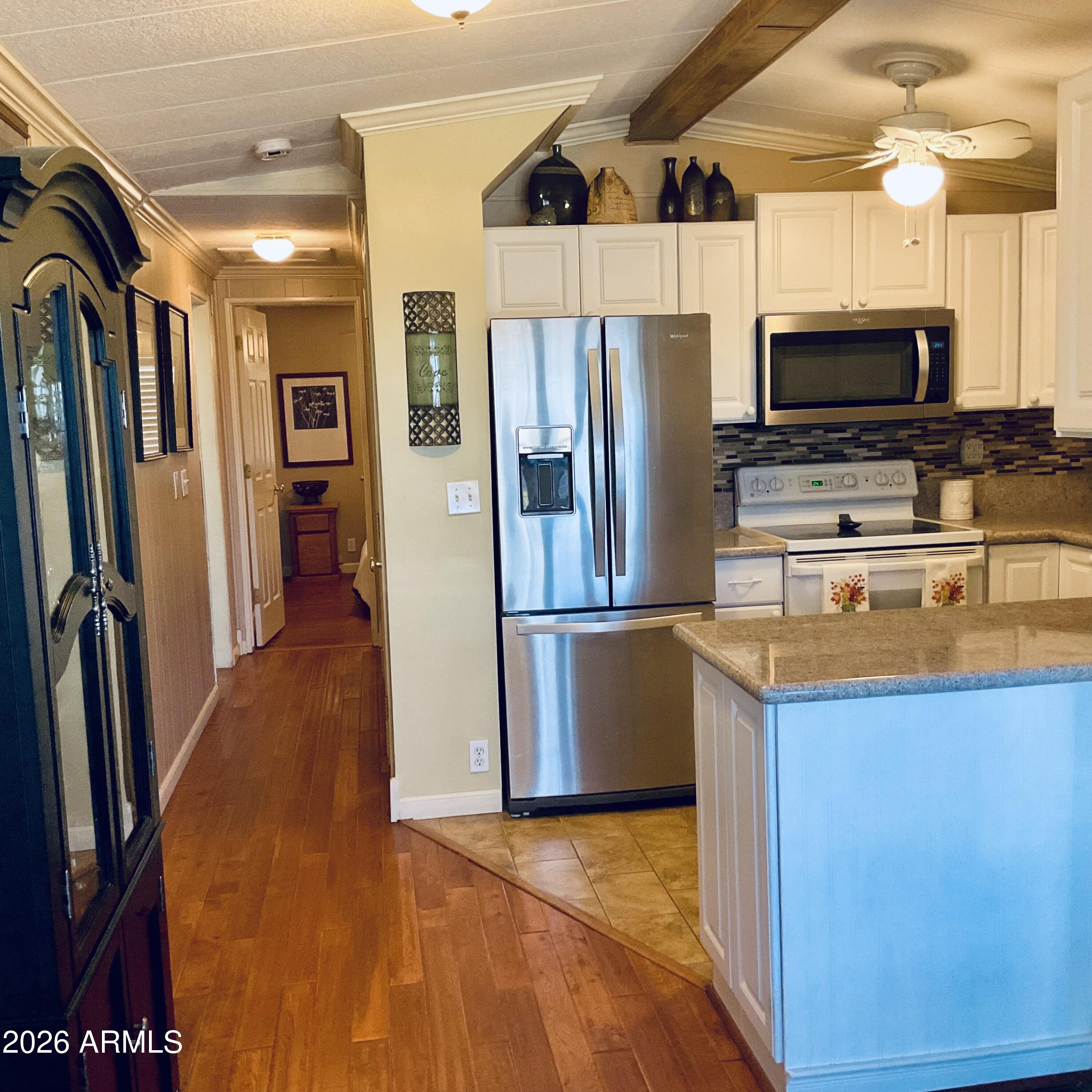 3036 East Utopia Road, Unit 52 Phoenix, AZ 85050 - Photo 13 of 36 Kitchen to bedrooms
