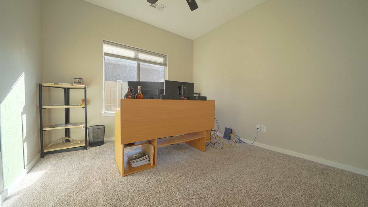 2476 Zenith Lane, Unit B Grand Junction, CO 81505 - Photo 16 of 24 a room with storage and utility
