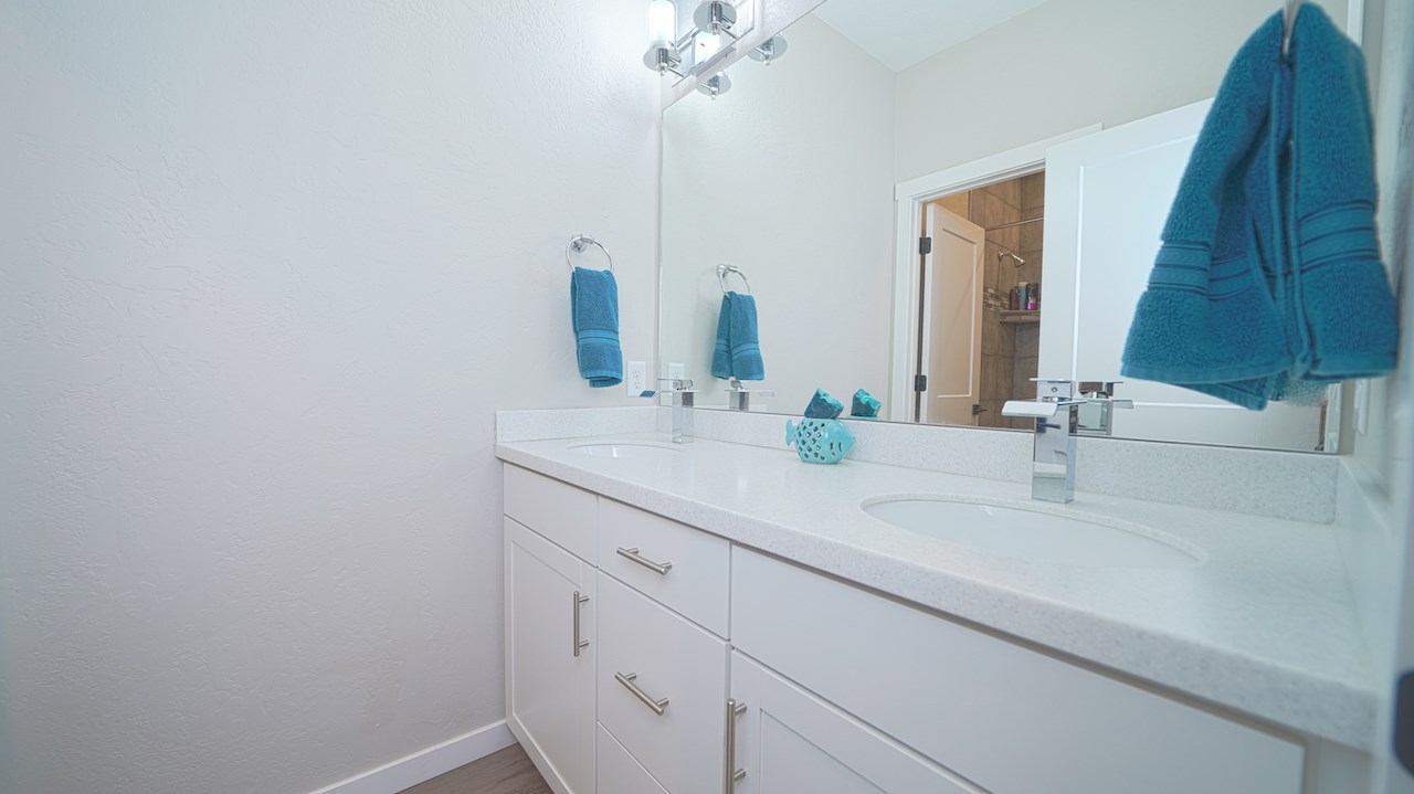 2476 Zenith Lane, Unit B Grand Junction, CO 81505 - Photo 17 of 24 a bathroom with a sink and a mirror