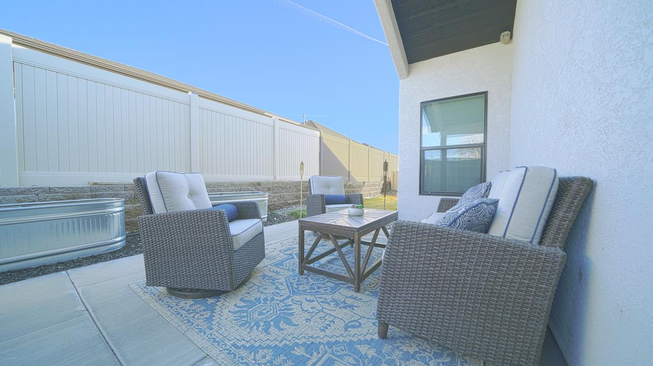 2476 Zenith Lane, Unit B Grand Junction, CO 81505 - Photo 20 of 24 a living room with furniture and a table