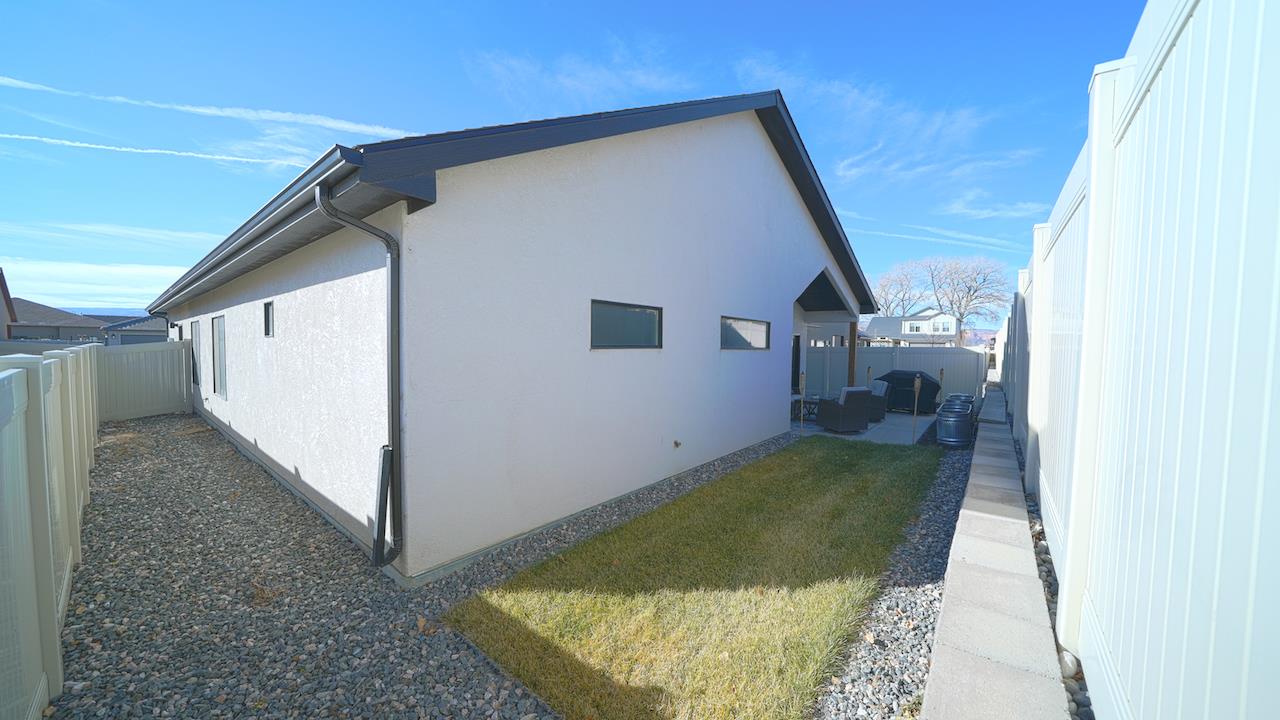 2476 Zenith Lane, Unit B Grand Junction, CO 81505 - Photo 21 of 24 a view of a house with a backyard