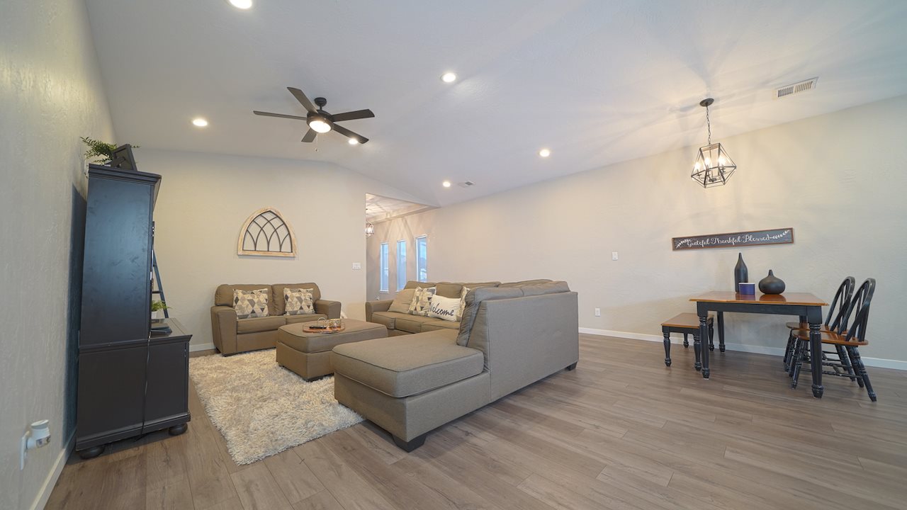 2476 Zenith Lane, Unit B Grand Junction, CO 81505 - Photo 4 of 24 a living room with furniture and a wooden floor