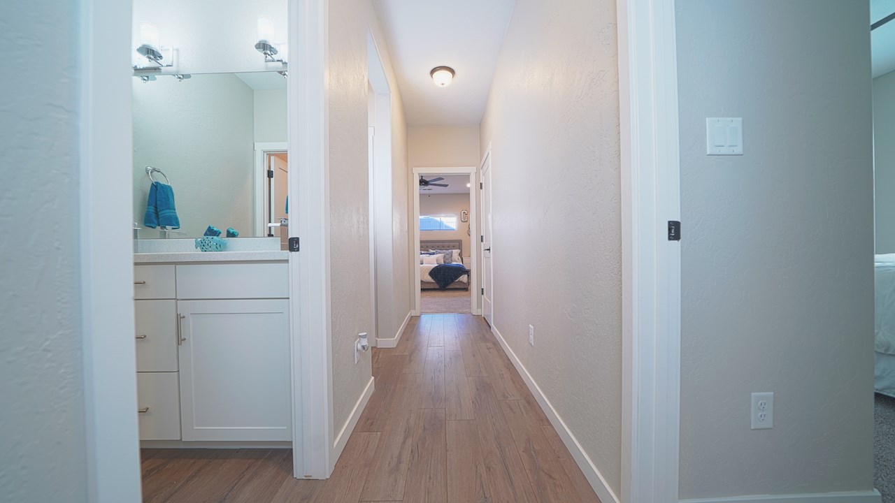 2476 Zenith Lane, Unit B Grand Junction, CO 81505 - Photo 9 of 24 a bathroom with a sink and mirror