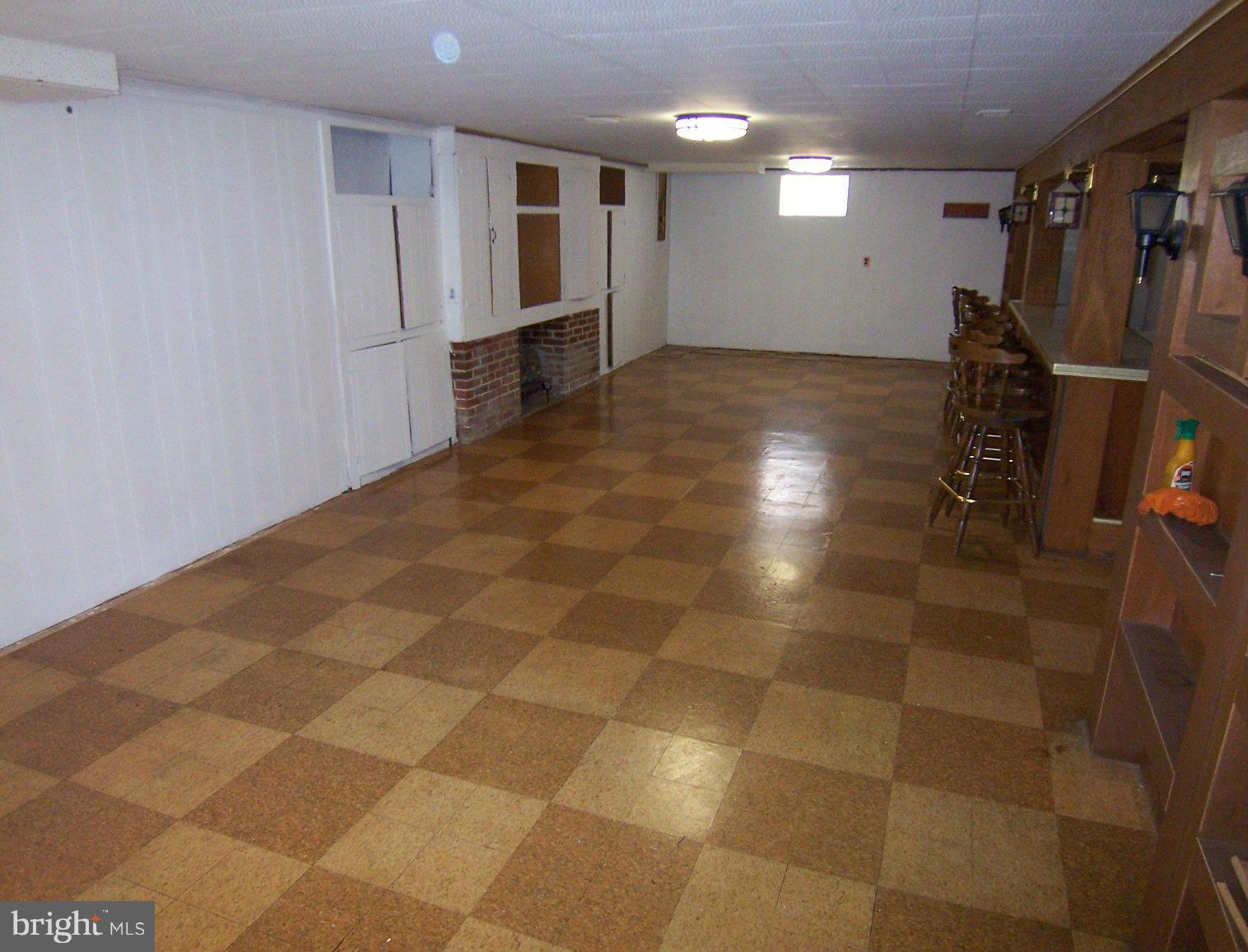 1505 Cavel Road Rosedale, MD 21237 - Photo 20 of 27 a view of a livingroom with an empty space