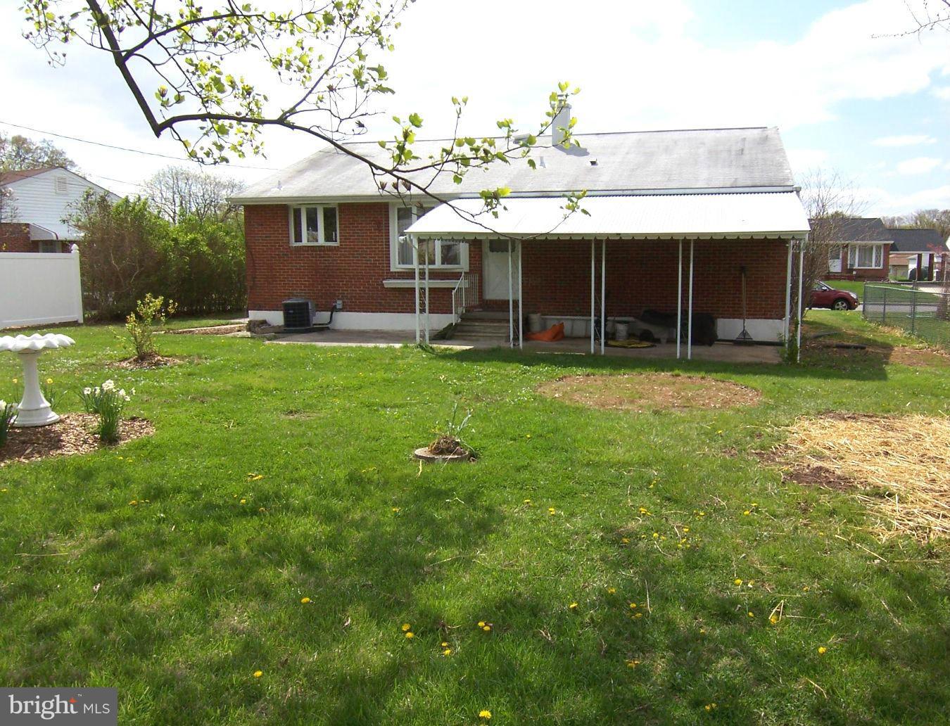 1505 Cavel Road Rosedale, MD 21237 - Photo 27 of 27 a view of a house with backyard and garden