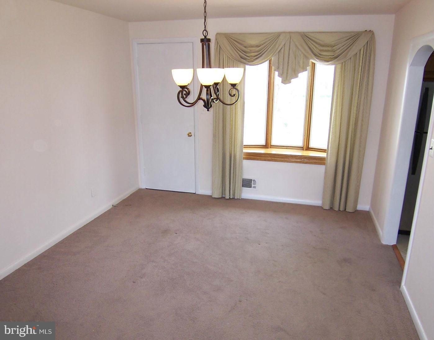 1505 Cavel Road Rosedale, MD 21237 - Photo 7 of 27 a view of a window in an empty room