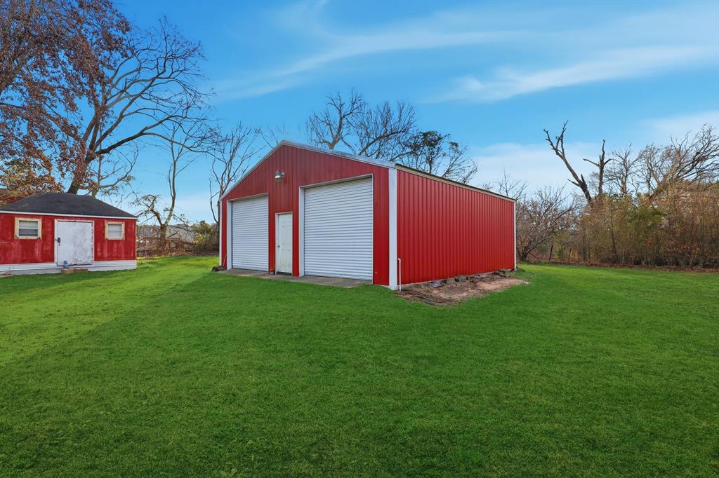 240 Fm 3421 Daingerfield, TX 75638 - Photo 20 of 27 a view of a back yard of the house