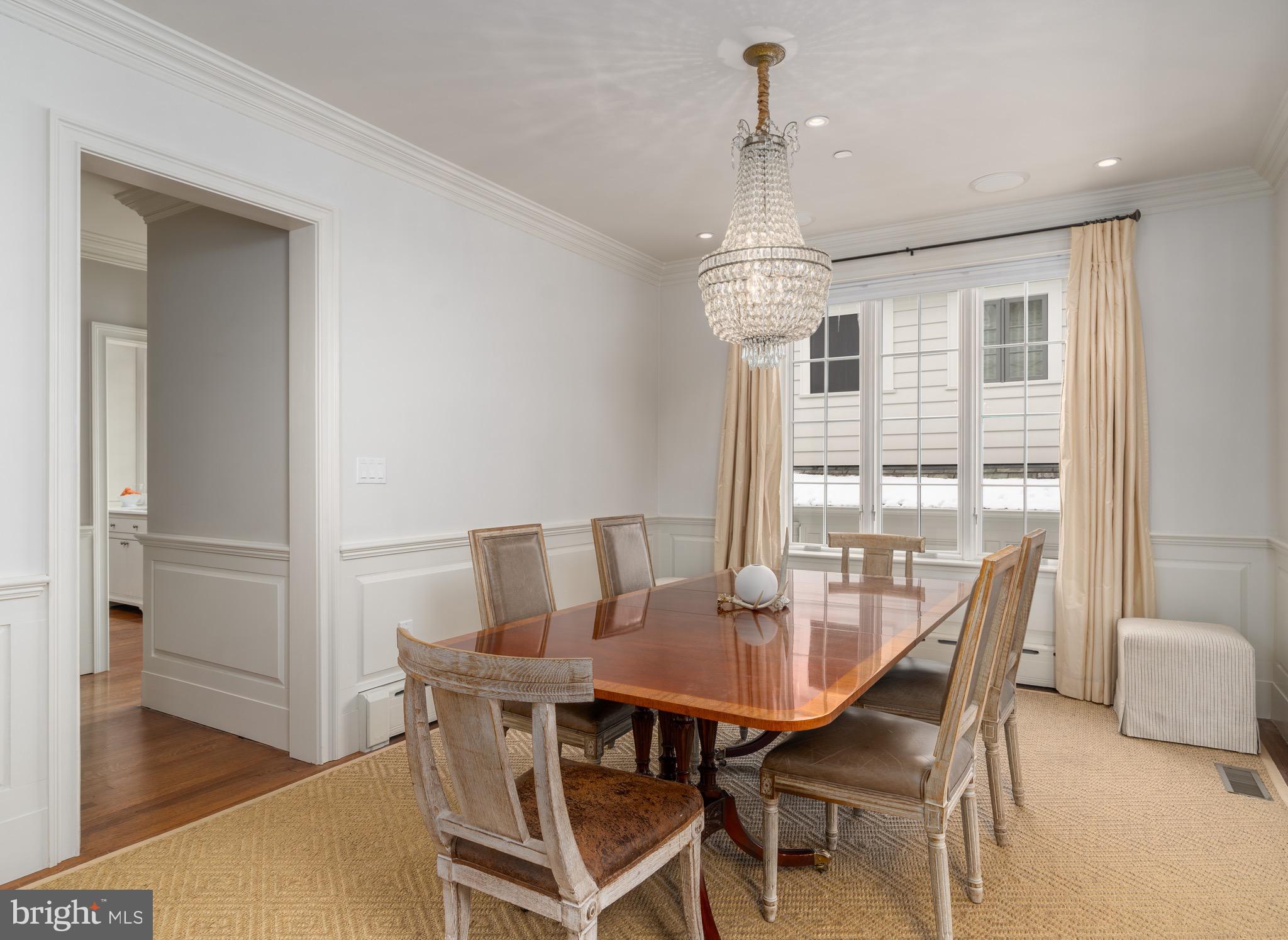 2701 36th Street Northwest Washington, DC 20007 - Photo 16 of 62 a view of a dining room with furniture window and wooden floor