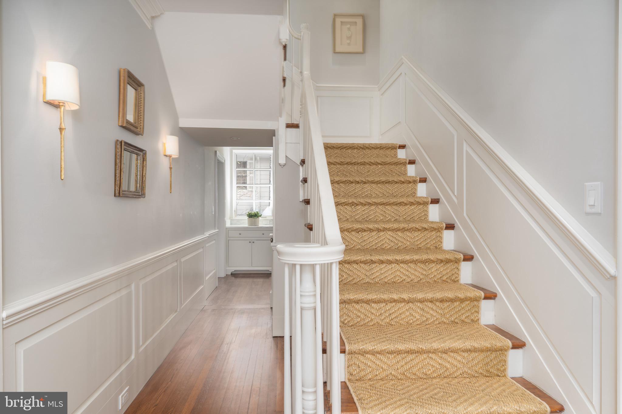 2701 36th Street Northwest Washington, DC 20007 - Photo 31 of 62 a view of entryway and hall with wooden floor