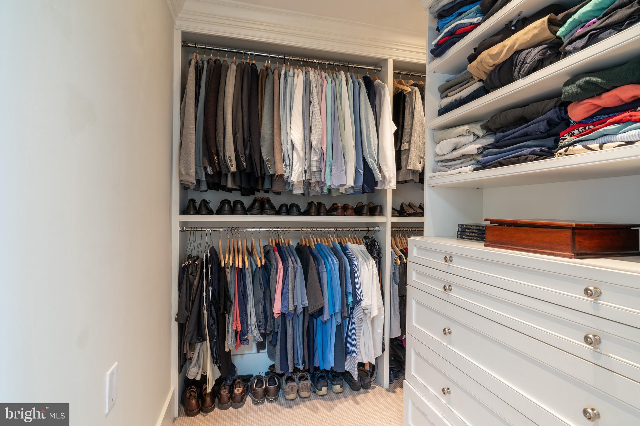 2701 36th Street Northwest Washington, DC 20007 - Photo 39 of 62 a view of walk in closet with clothes and shoes