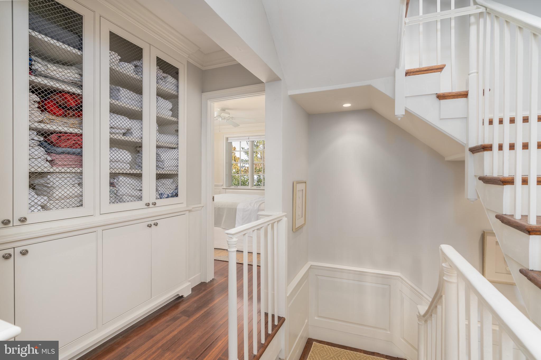 2701 36th Street Northwest Washington, DC 20007 - Photo 40 of 62 a view of staircase with white walls and windows