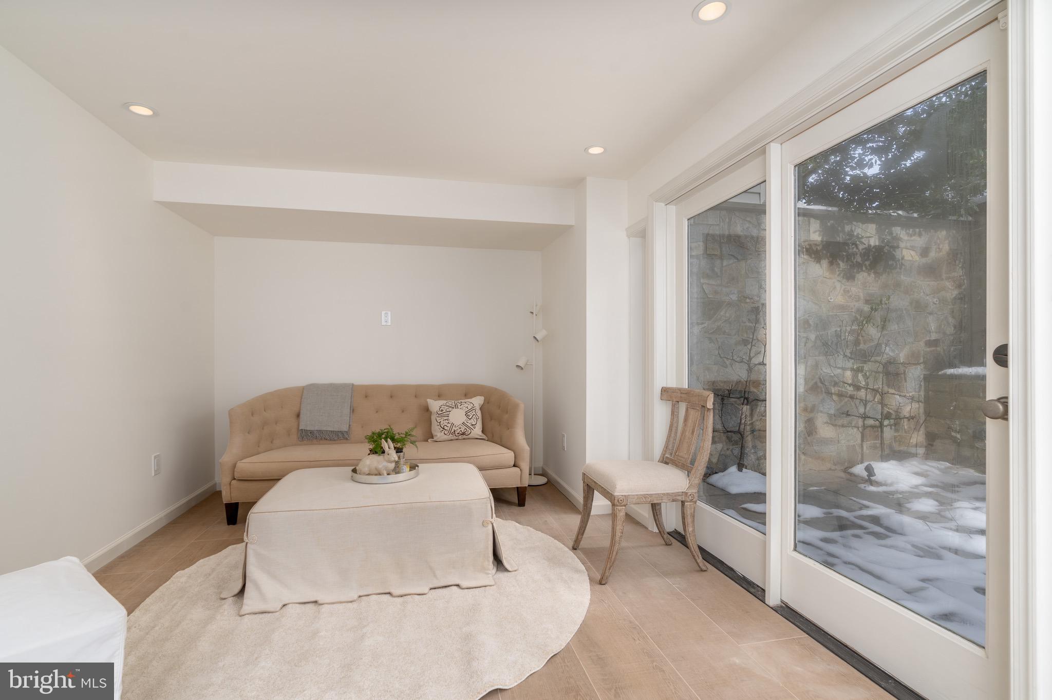 2701 36th Street Northwest Washington, DC 20007 - Photo 52 of 62 a bedroom with a bed and wooden floor